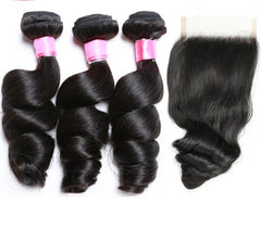 ombre Peruvian loose wave bundlesOmbre Peruvian loose wave bundles with closure human hair laid flatwith closure human hair on display